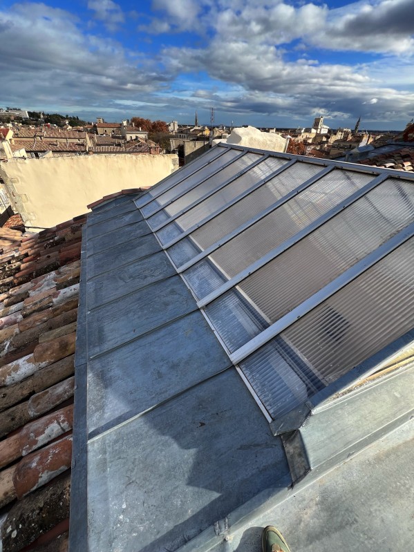 Rénovation complète d'une toiture Square de la Bouquerie à Nîmes dans le Gard