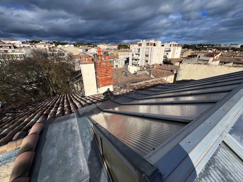 Rénovation complète d'une toiture Square de la Bouquerie à Nîmes dans le Gard