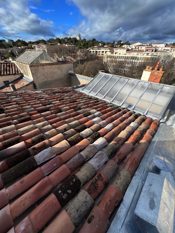 Rénovation complète d'une toiture Square de la Bouquerie à Nîmes dans le Gard