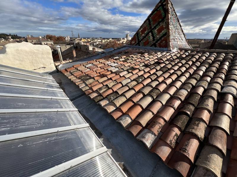 Rénovation complète d'une toiture Square de la Bouquerie à Nîmes dans le Gard