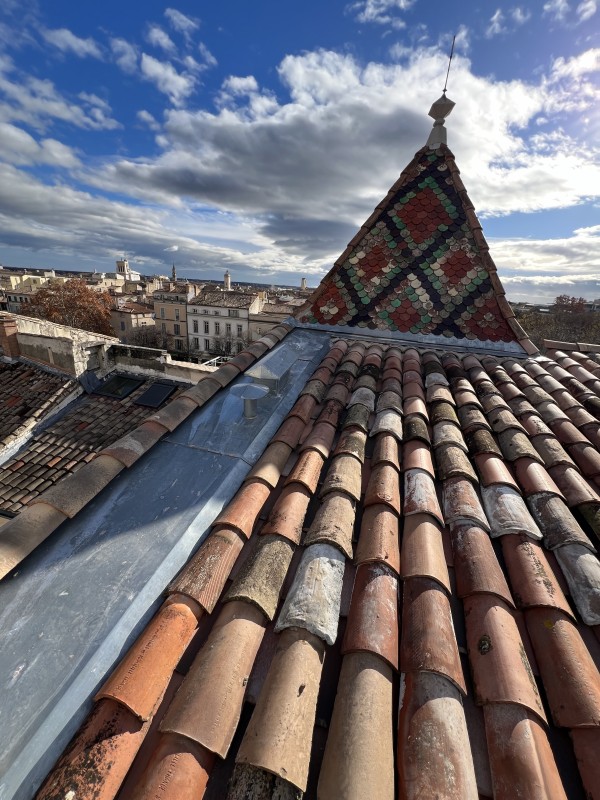 Rénovation complète d'une toiture Square de la Bouquerie à Nîmes dans le Gard